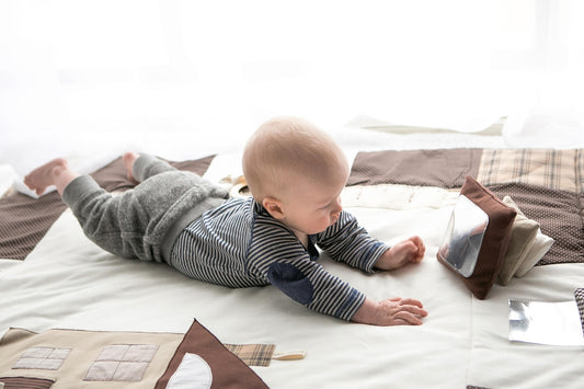 Baby playing with Karloova handmade soft fabric stacking tower toy for babies