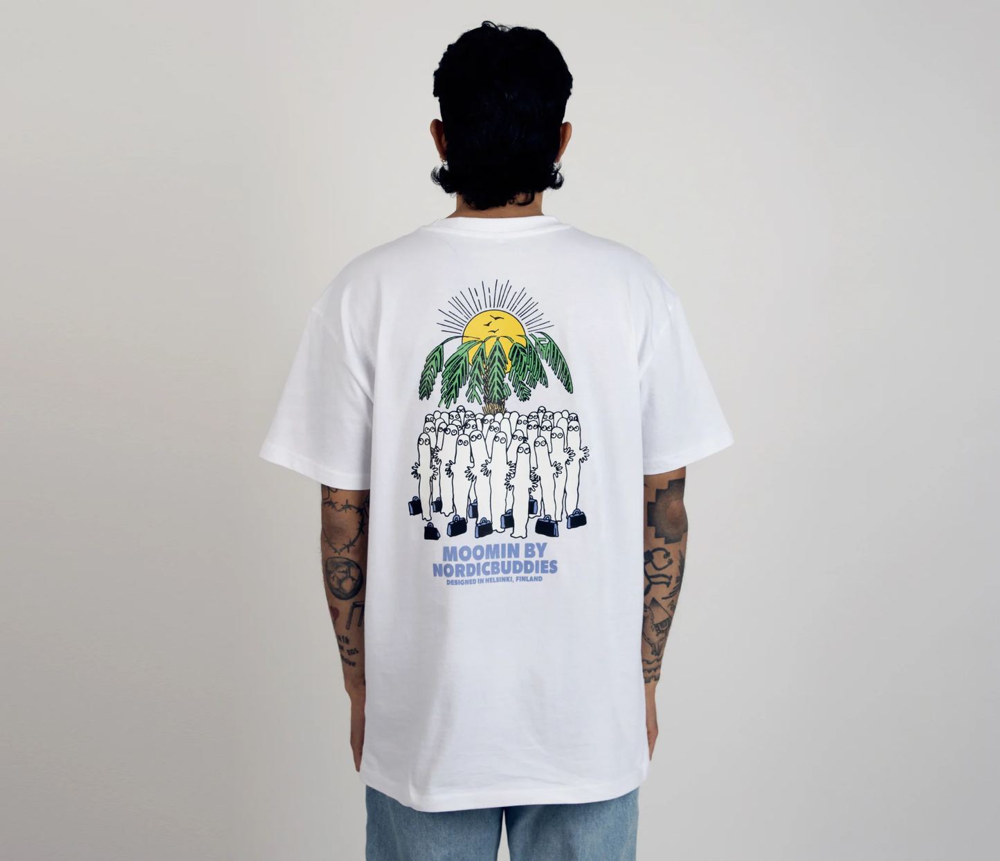 Male model wearing the Hattifatteners Surf Trip T-Shirt White - Casual Moomin apparel. - Back view