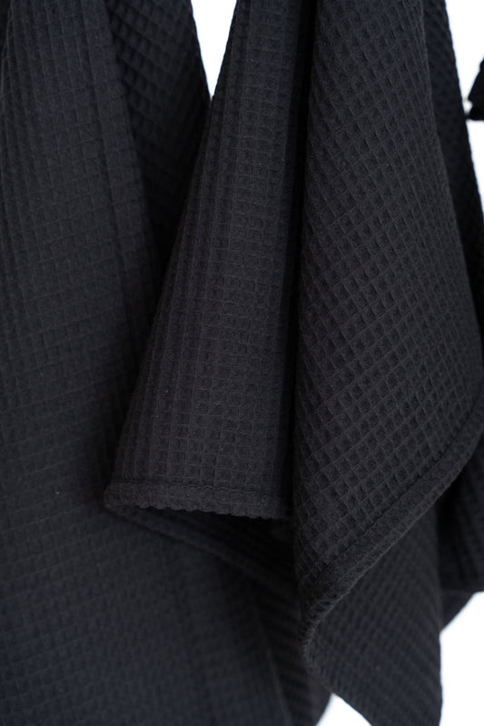 Honeycomb Waffle Weave Texture Close-Up on Black Cotton Towel | NUSS