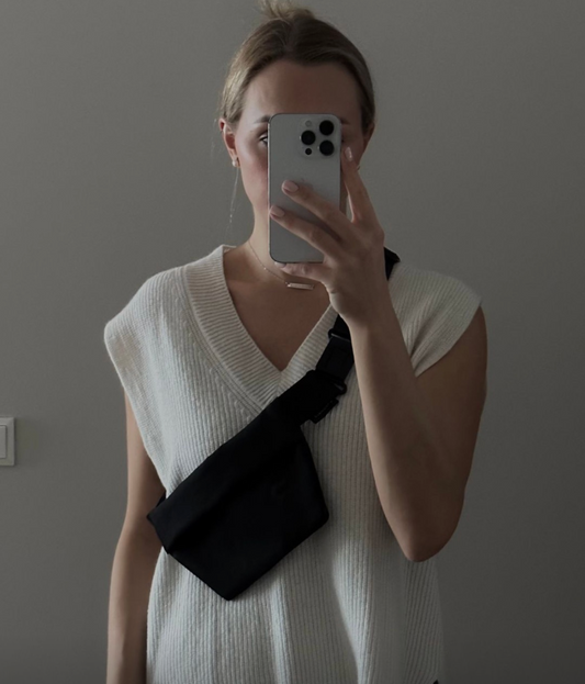 OSLO MINI Crossbody Bag in recycled felt worn casually by a model, sustainable fashion