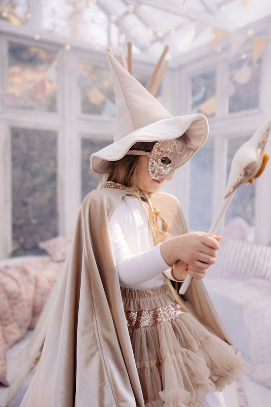 Lifestyle: Child wearing the Rose Gold cat mask for a birthday party