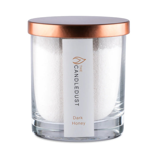 Candledust Dark Honey warm scented pearled candle in a 160g transparent glass jar with cotton wick