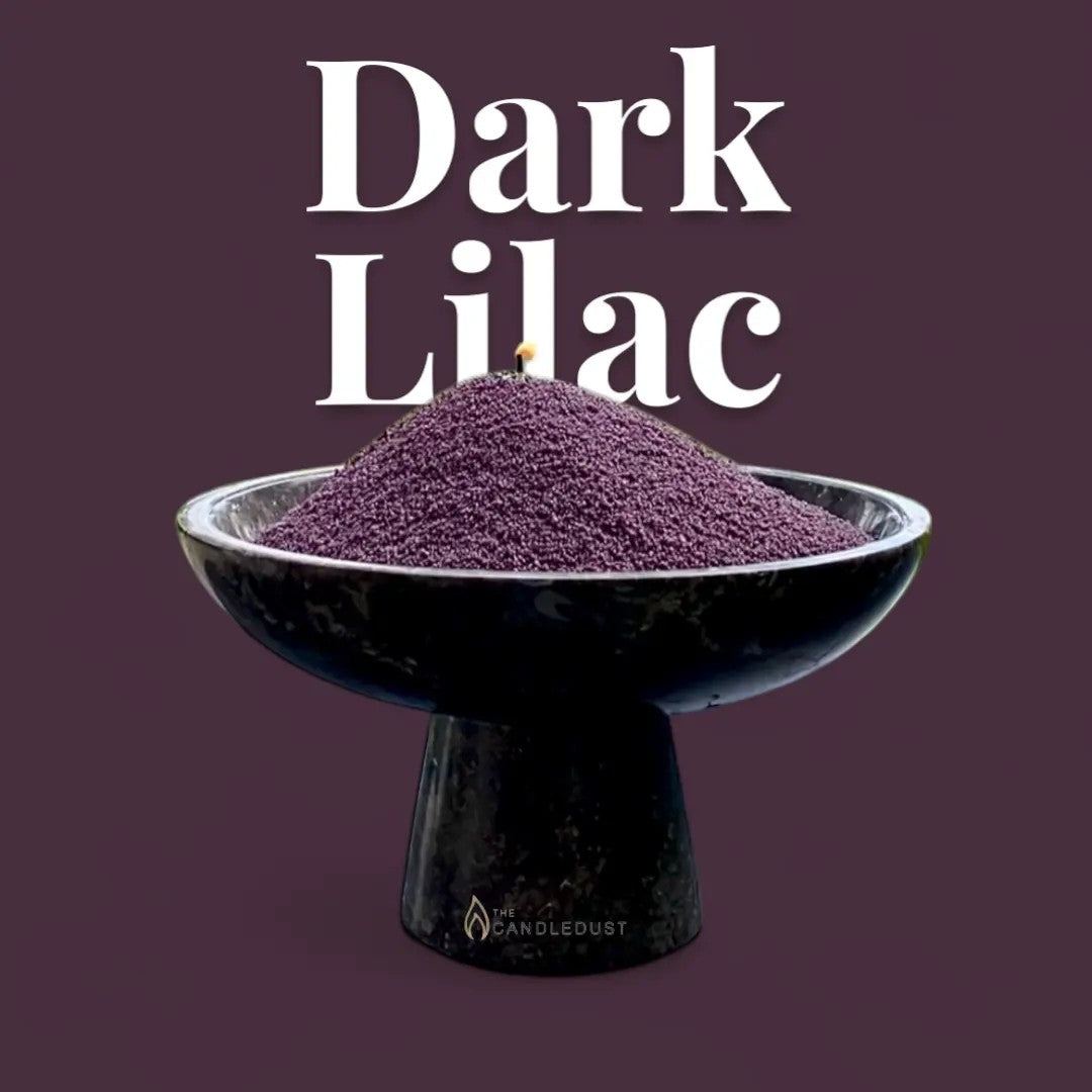 Dark Lilac text on a deep lilac background with a glass vase of unlit pearled candle sand in the foreground