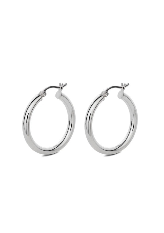 Pair of minimalist silver Django Hoops displayed against a crisp white background.