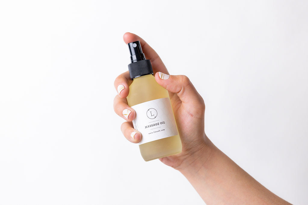 female model handling CBD Eucalyptus Massage Oil – Natural Aromatherapy Body Oil