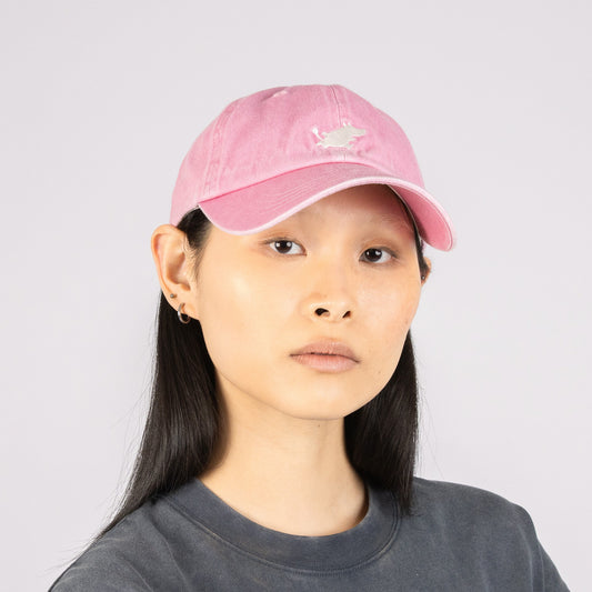Female model wearing the pastel pink Moomin Classics denim dad cap by Nordicbuddies