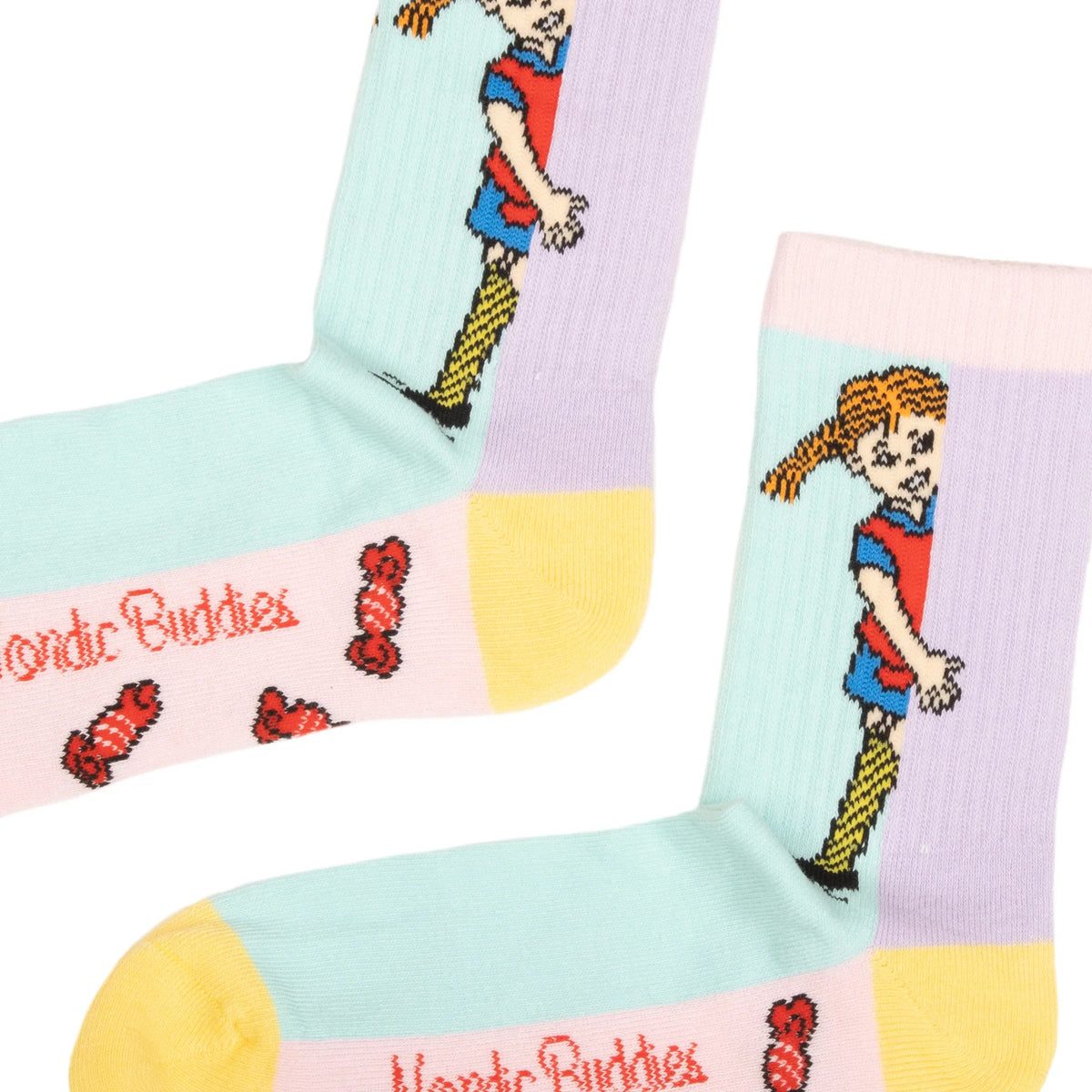 Close-up of Pippi Longstocking character graphic and colorful candy panel pattern on women's socks