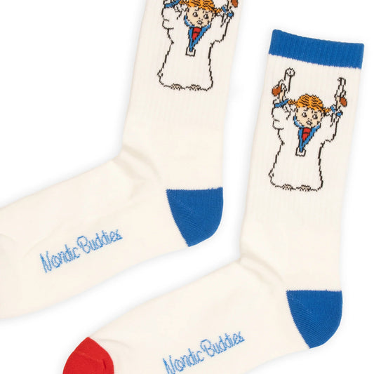 Detailed close-up of Pippi Longstocking knit artwork and retro stripe pattern on cotton socks