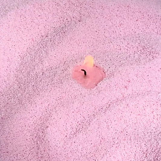 Close-up of vibrant Baby Pink vegetable wax pearls texture