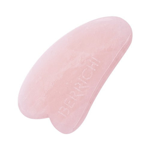 Detail of Berrichi Rose Quartz Gua Sha massage tool close up