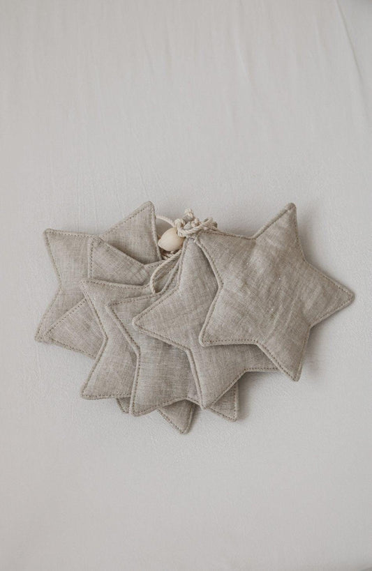 Top View Moi Mili Sand Star Dust Star Garland - Warm beige hanging bunting with subtle shimmer