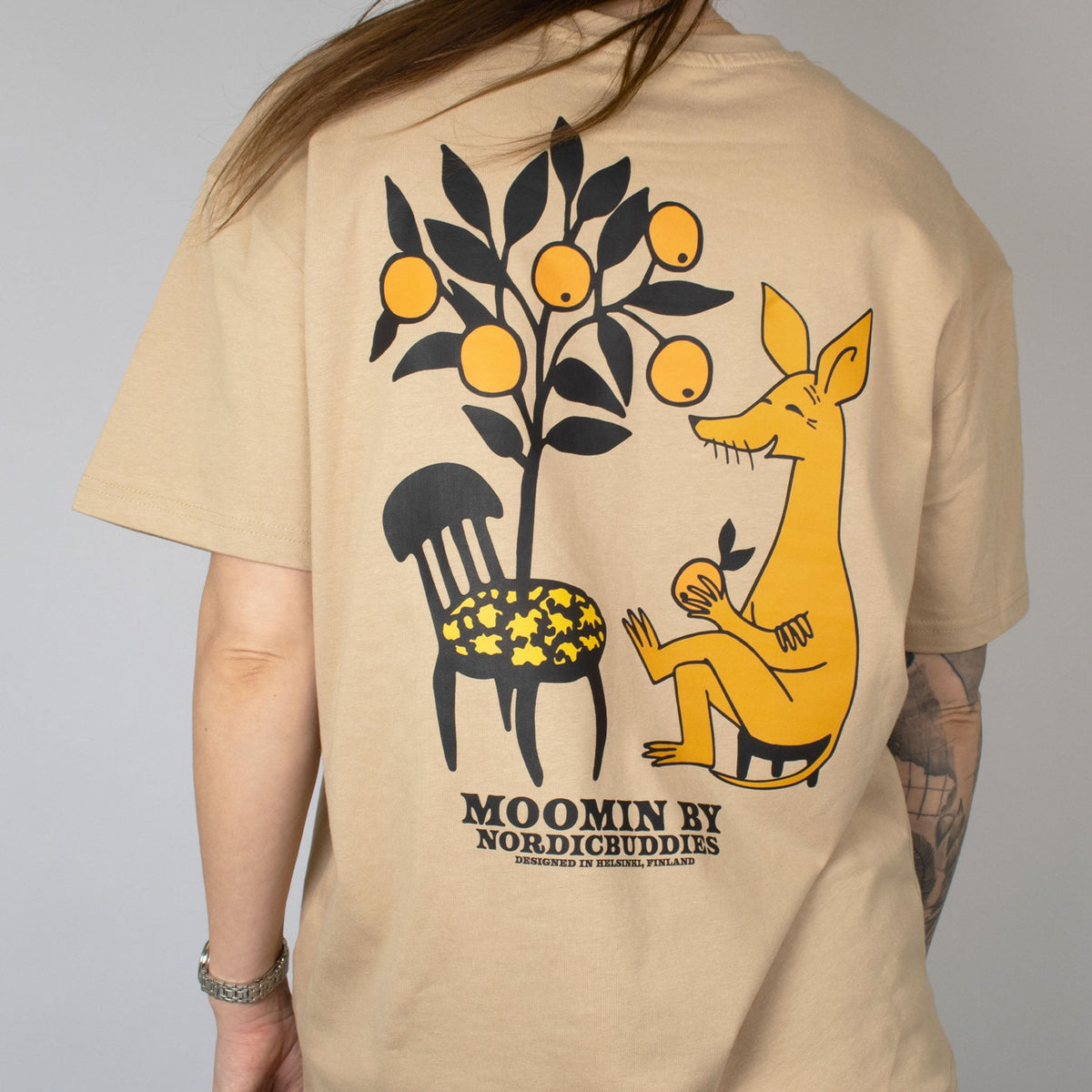 Back print detail of the Organic Cotton Premium T-Shirt Sniff Beige - Official Moomin character graphic wearing by female model