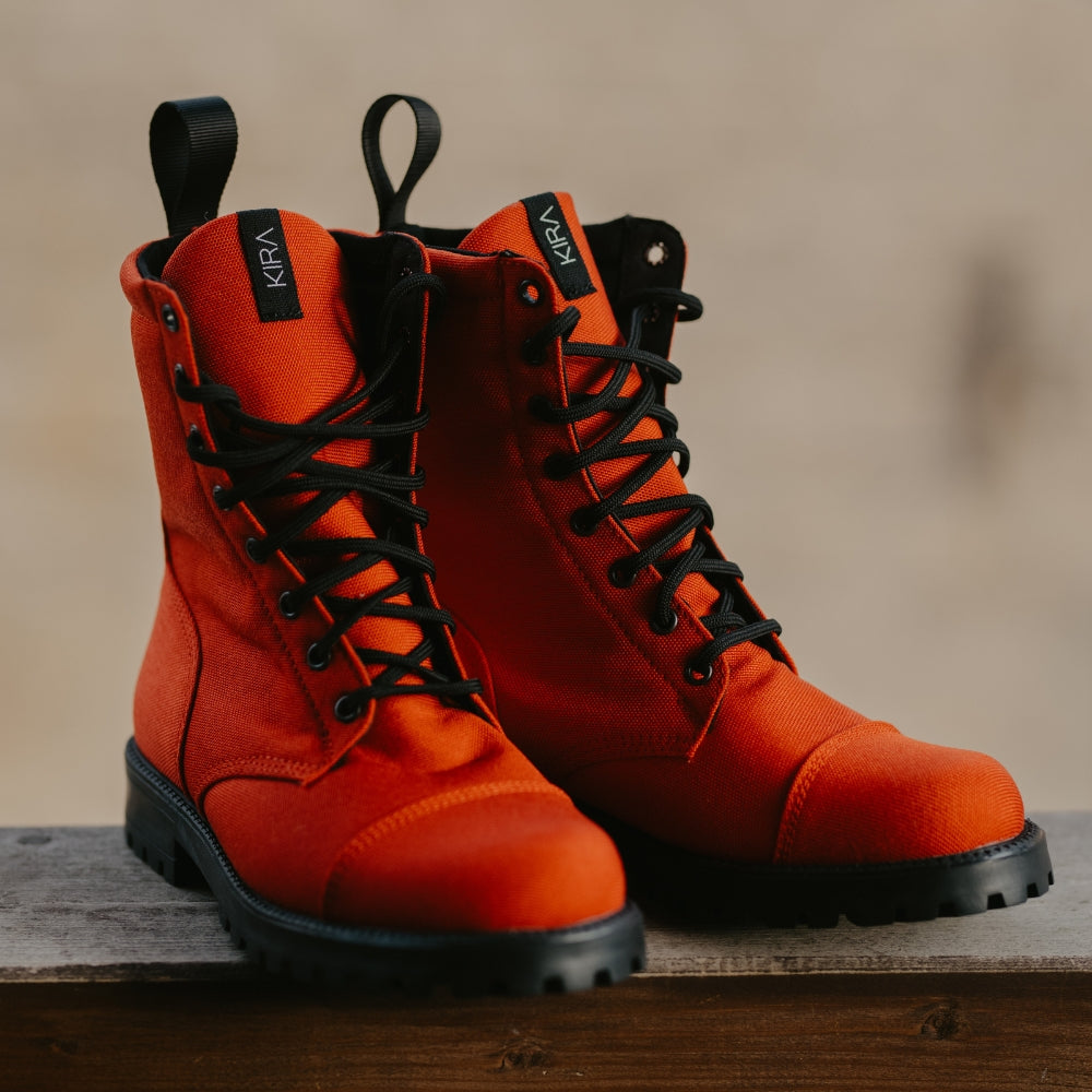 Main profile view of the red KIRA 5.0 sustainable sneakers, crafted from 100% vegan and eco-friendly materials.