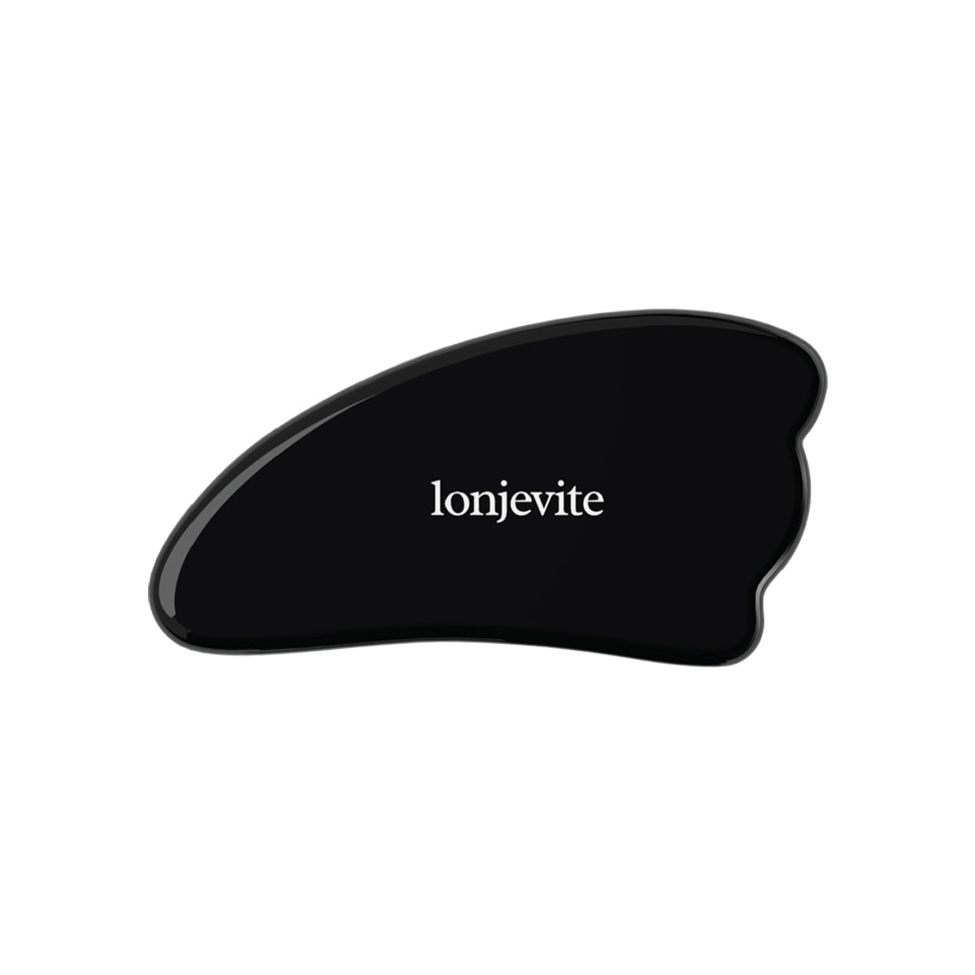 Black Obsidian Gua Sha tool by OlgaCola Milano for facial sculpting and lifting