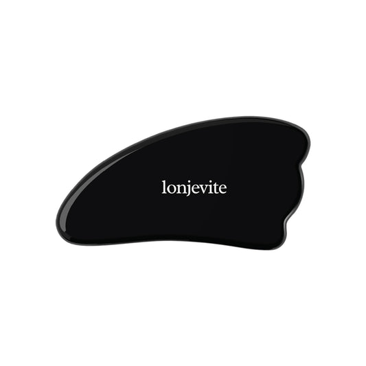 Black Obsidian Gua Sha tool by OlgaCola Milano for facial sculpting and lifting