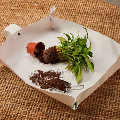 Durable eco-friendly potting mat with snap corners for easy cleaning