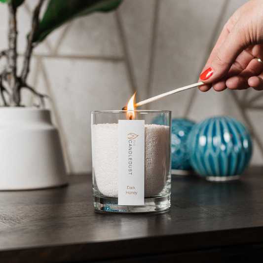 Close up of burning wick in powdered candle glass jar - Dark Honey 160g