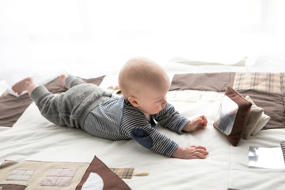 Baby playing with Karloova handmade soft fabric stacking tower toy for babies