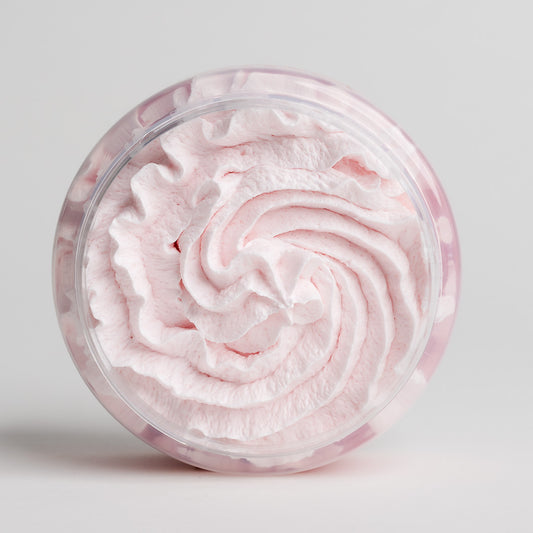 Vibrant pink texture of the cranberry whipped body scrub with organic oils