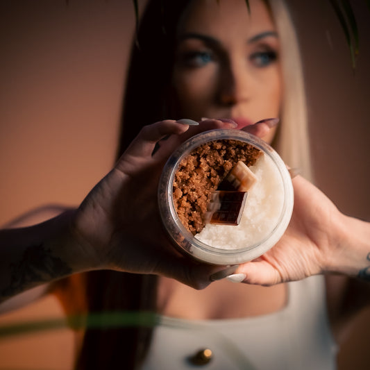 Rich texture of chocolate and vanilla body scrub with organic sugar crystals