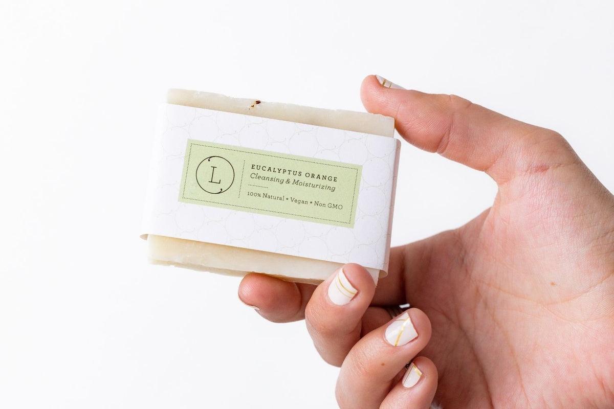 Woman's hand holding Eucalyptus Handmade Soap Bars - Natural vegan cold process soap 2-pack | Lizush