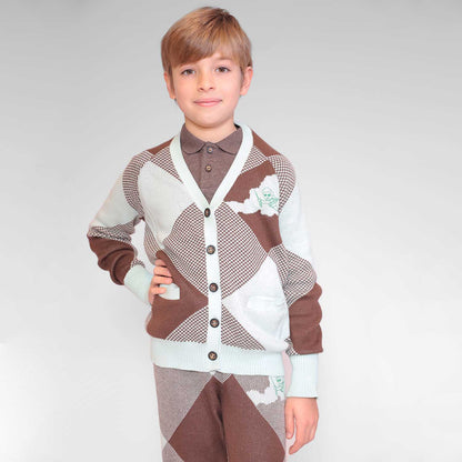 Child wearing a Infantium Victoria chocolate brown and mint green color-block knitted organic on a plain background