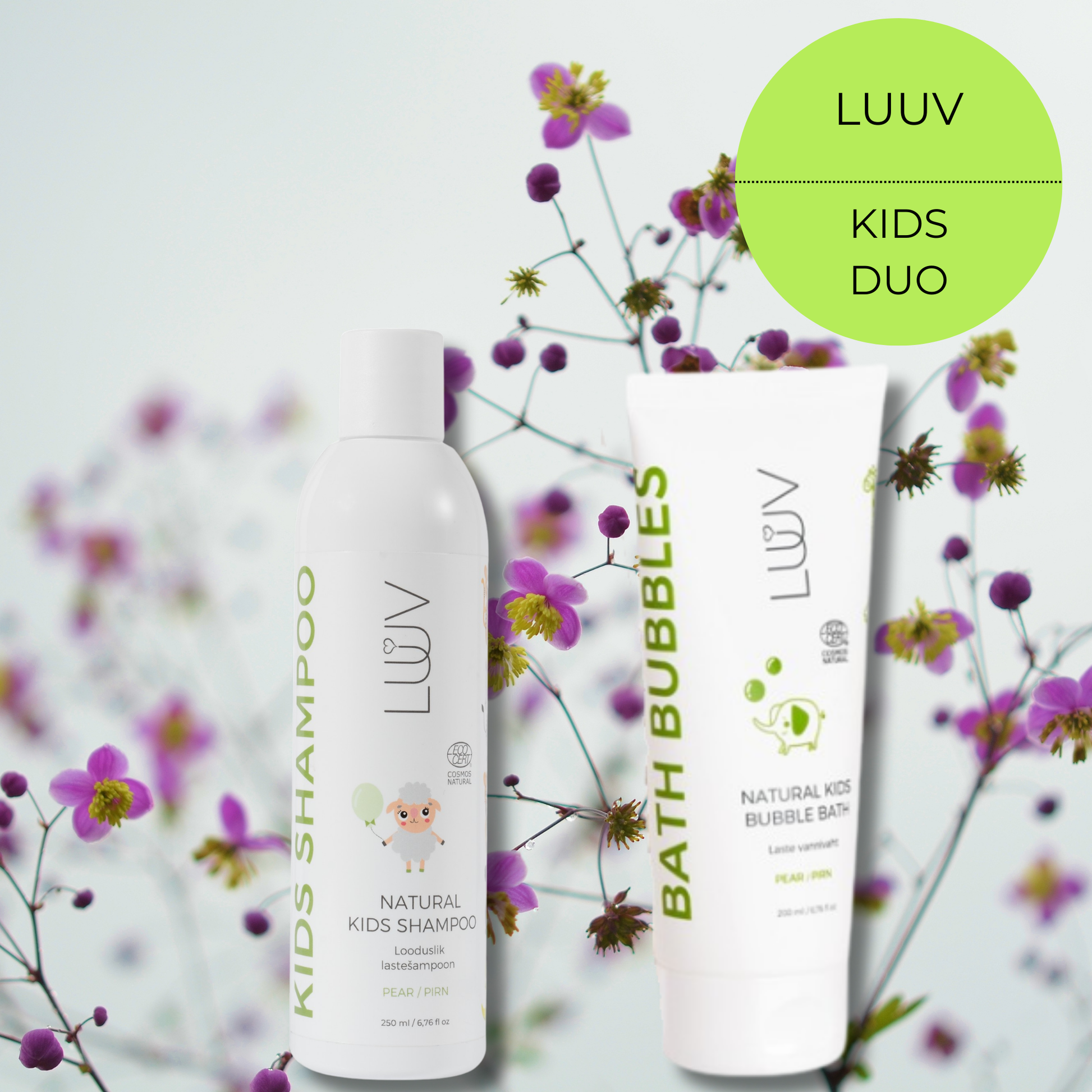 LUUV Natural Kids Duo set featuring a white bottle of Kids Shampoo abd a white tube of Bubble Bath with pear illustration, set against a background of purple wildflowers.