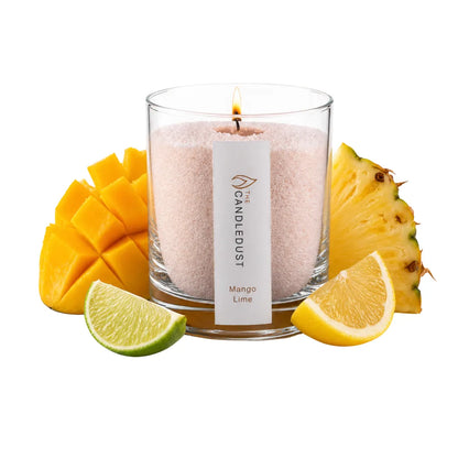 Lit Candledust Mango Lime scented pearled candle in a 160g glass jar with lime pineapple and mango