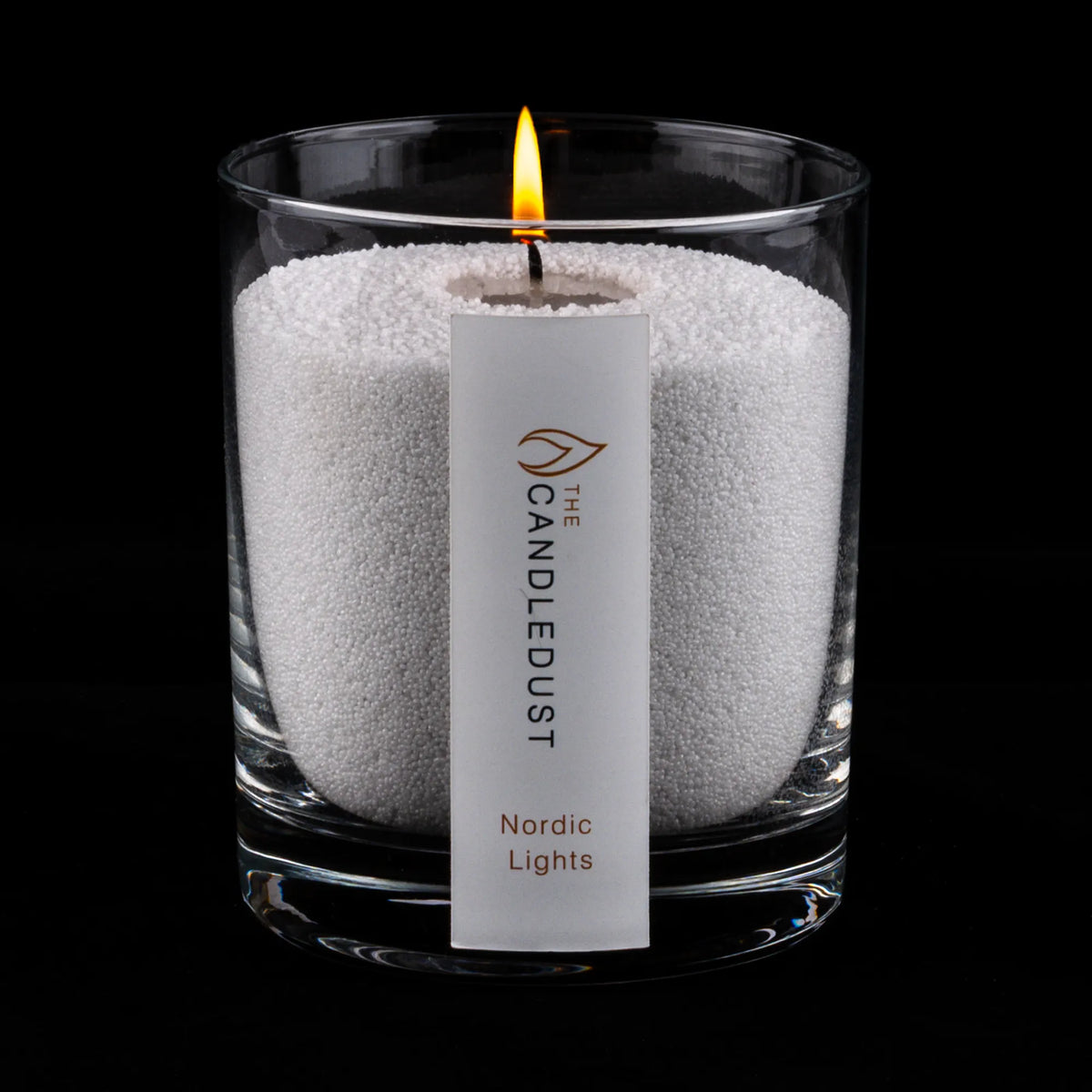Candledust Nordic Lights scented pearled candle in a 160g glass jar on a black background