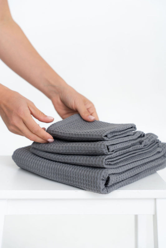 4-Piece Gray Organic Waffle Cotton Towel Set Folded Stack | NUSS