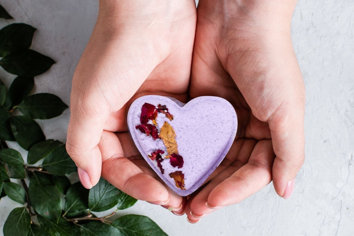 Heart-Shaped Shower Steamers Gift Set - Close-up of pink heart shower steamer with essential oils | Lizush