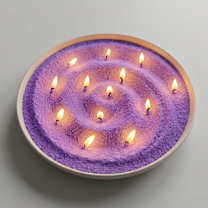 Large decorative tray filled with Amethyst pearled candle sand and multiple lit cotton wicks burning cleanly