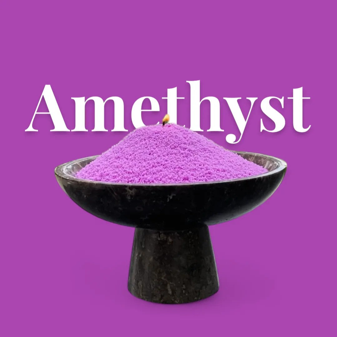 Amethyst text on a matching purple background with a dark vase full of unlit pearled candle sand in the foreground