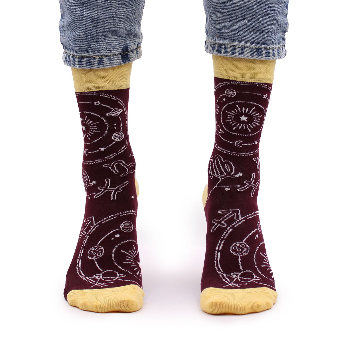 Front view of Zodiac eco-friendly bamboo socks worn on bare feet, highlighting the celestial horoscope pattern