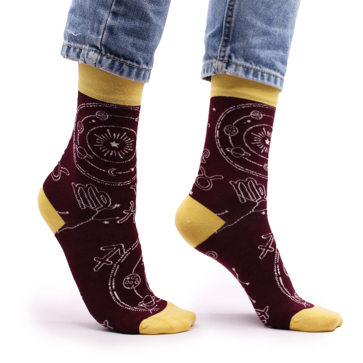 Side view of Hop Hare Zodiac bamboo socks worn barefoot, showcasing the astrological symbol motif on the ankle