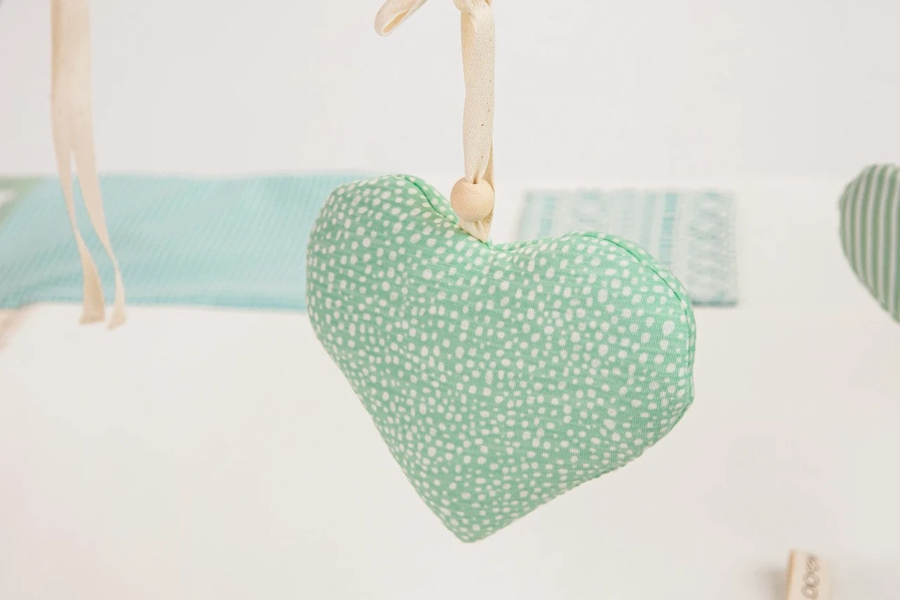 Close-up Handmade Nordic design baby play gym for newborn tummy time and exploration, 120x120cm - Mint Green