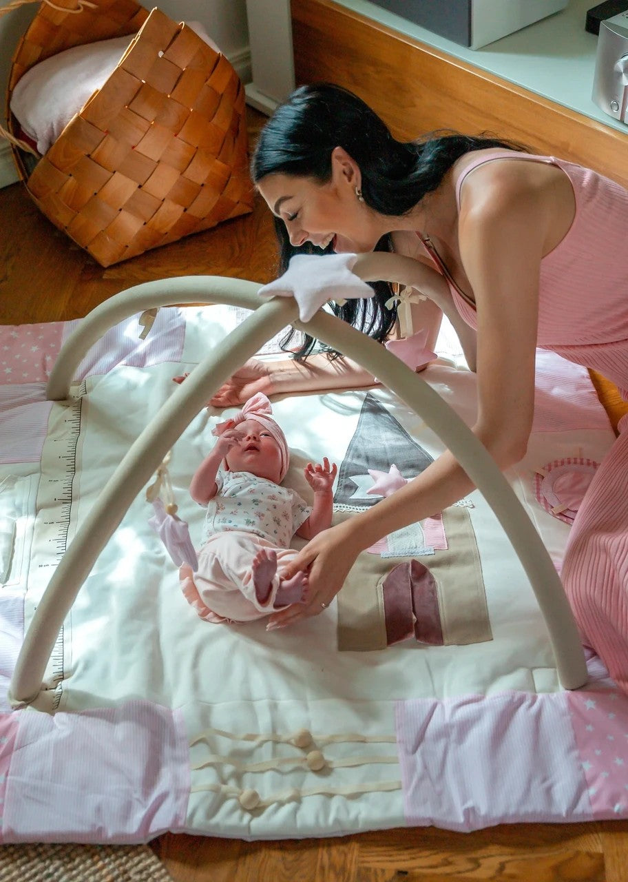 Beautiful eco-friendly baby play gym set in a modern home nursery interior, 120x120cm - Pink