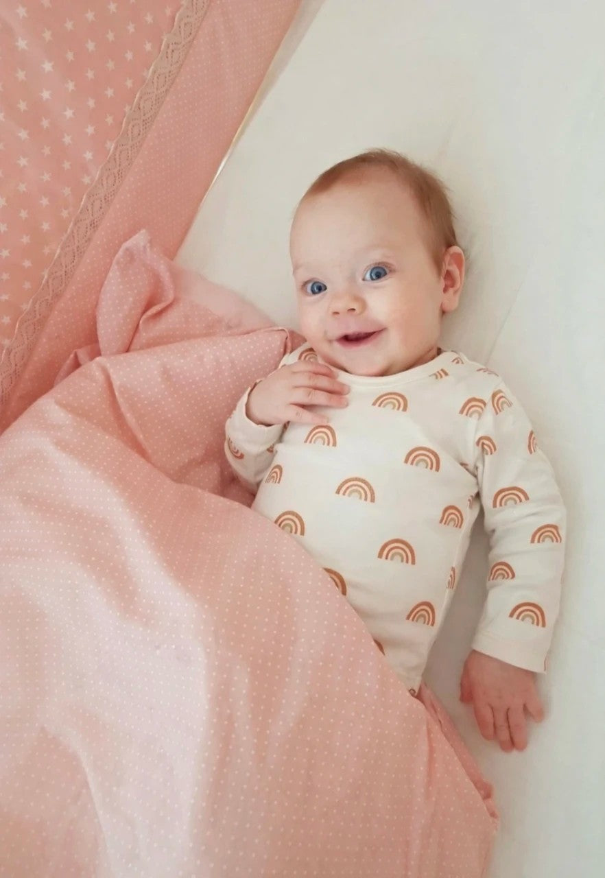 Safe and chemical-free baby bodysuit featuring easy diaper change snap - Rainbow