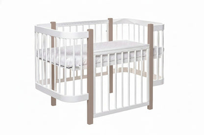 Detail of the sustainable wooden slats on the KOTTO cappuccino baby bed