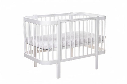 Safe sleep newborn mattress fitted perfectly inside the white KOTTO crib