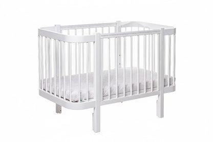 Clean and bright baby room decorated with the Elin white wooden crib