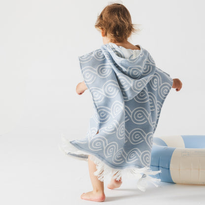Back view of hooded poncho showing comfortable fit - Light Blue