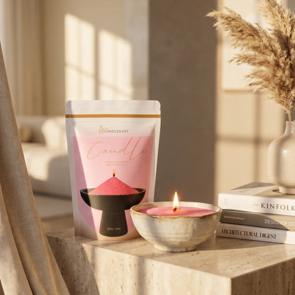 Elegant vase filled with Blush Vintage pearled candle sand and lit cotton wicks resting on a refined marble countertop