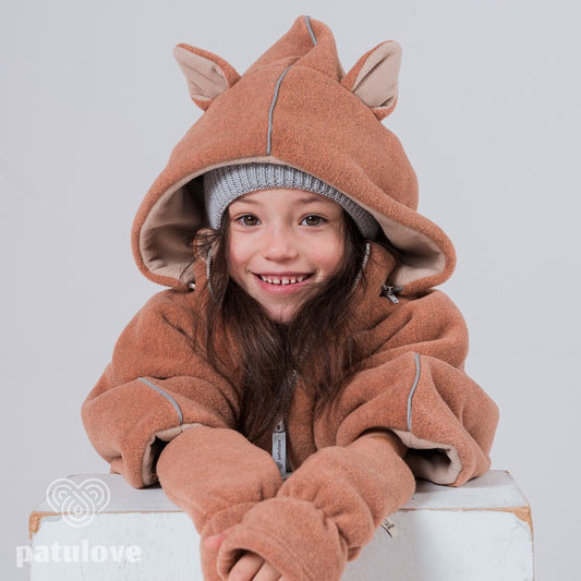 Close-up of cute animal ears on the hood - Fox