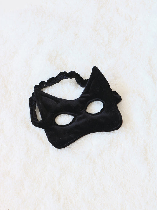 Close-up of the shimmering black sequins on the kids mask