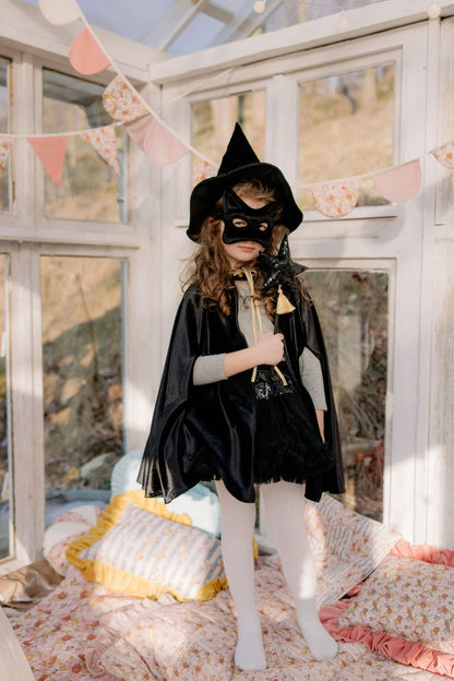 Lifestyle: Child wearing the Black sequined cat mask