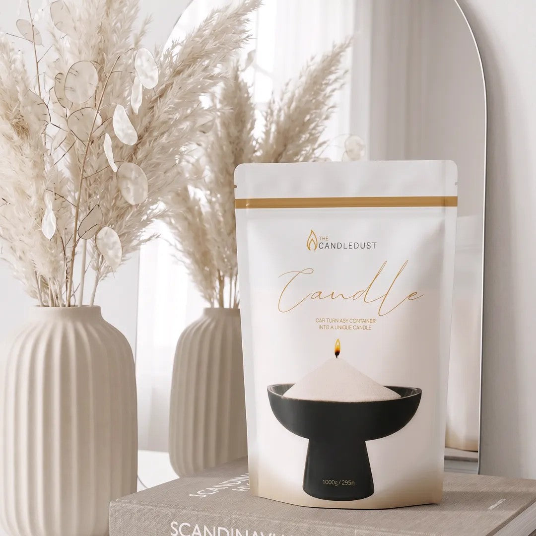 Candledust Champagne Rhubarb scented pearled candle sand in a 1kg resealable refill pouch near elegant vases