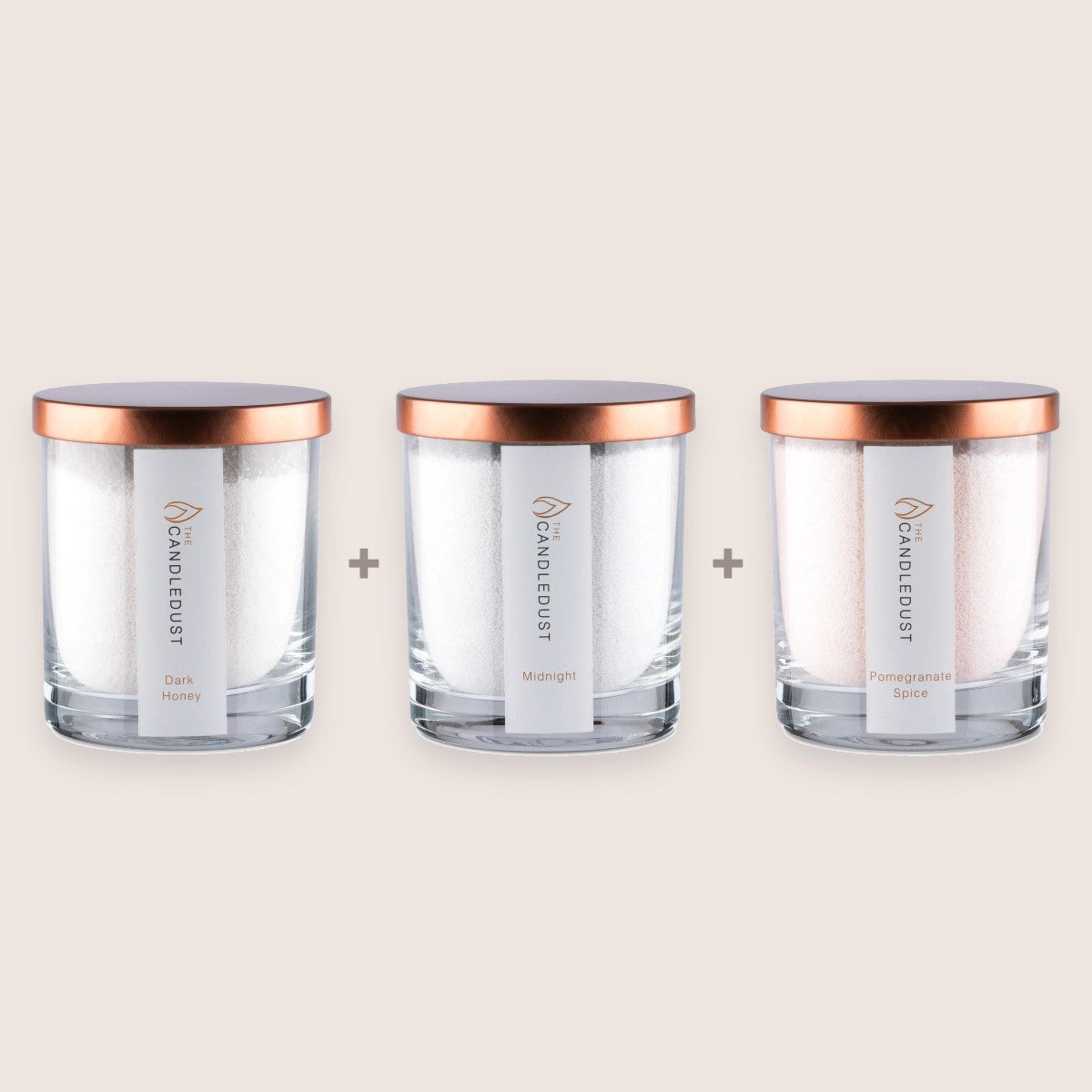 Candledust Cosy Discovery Trio set featuring three 160g scented glass candles in Dark Honey, Midnight, and Pomegranate Spice