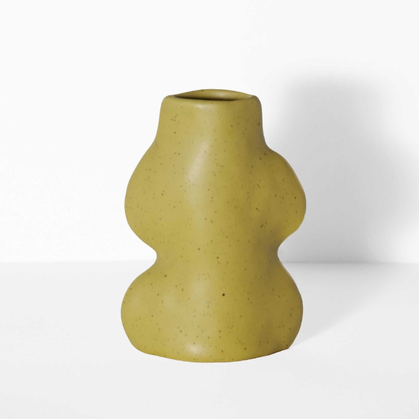 Handmade Fluxo ceramic vase in Pistachio with a unique gradient finish, crafted in Portugal. Contemporary sustainable home decor on That Green Store.