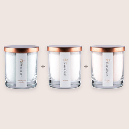 Candledust Fresh Discovery Trio set featuring three 160g scented glass candles in Lemongrass Ginger, Breeze, and Mango Lime